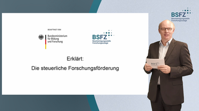 Zu sehen ist eine Momentaufnahme eines Erklärvideos mit Andreas Hoffknecht, Leiter der Bescheinigungsstelle Forschungszulage,